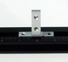 Sliding t-nut tooling block with threaded holes